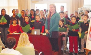 students from the Warren Prescott School are shown at the Zelma Lacey House for the Annual Christmas Card Conertst Ceremony.